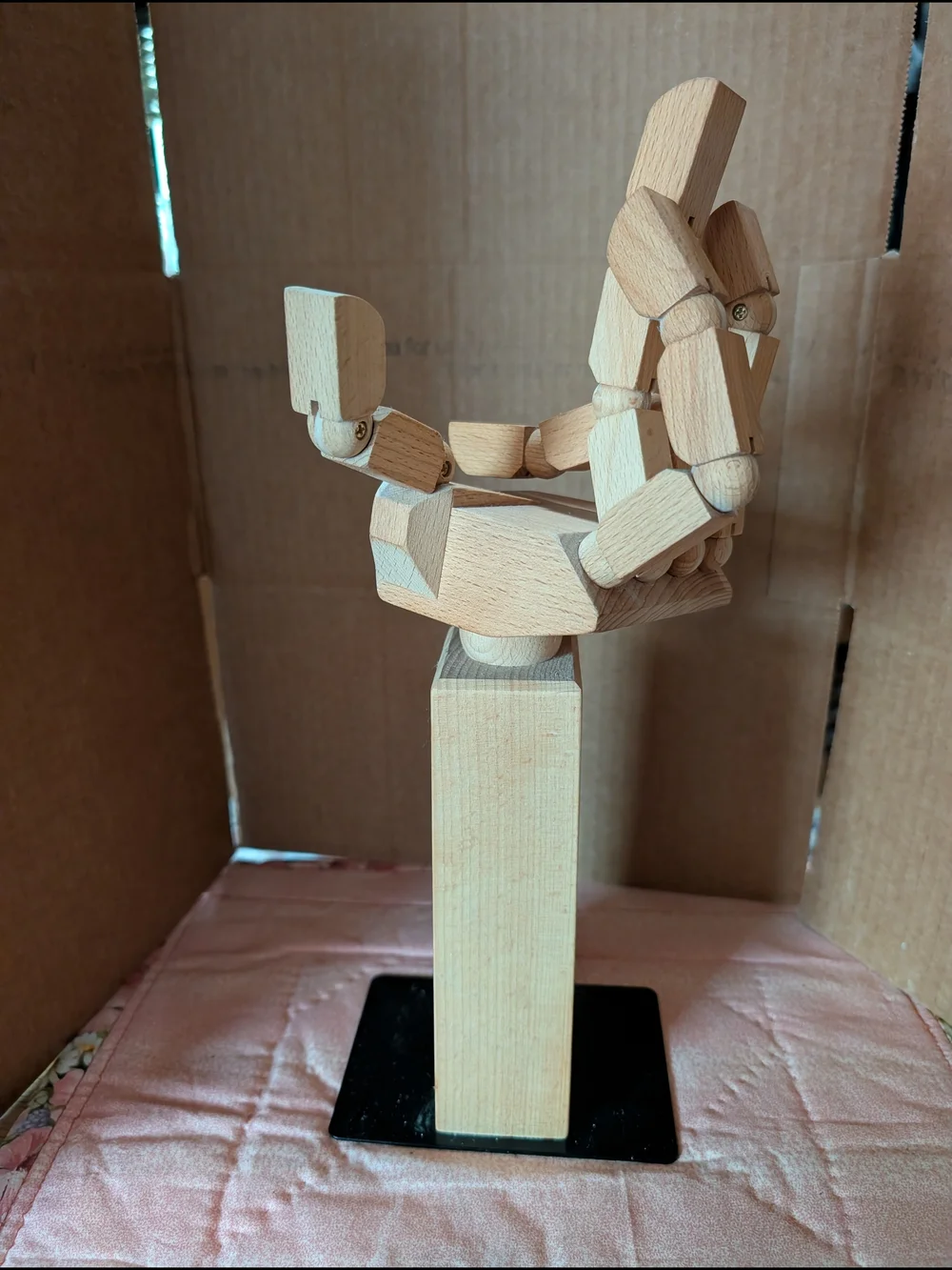 IKEA Natural Wood Articulated Hand Sculpture with Black Base